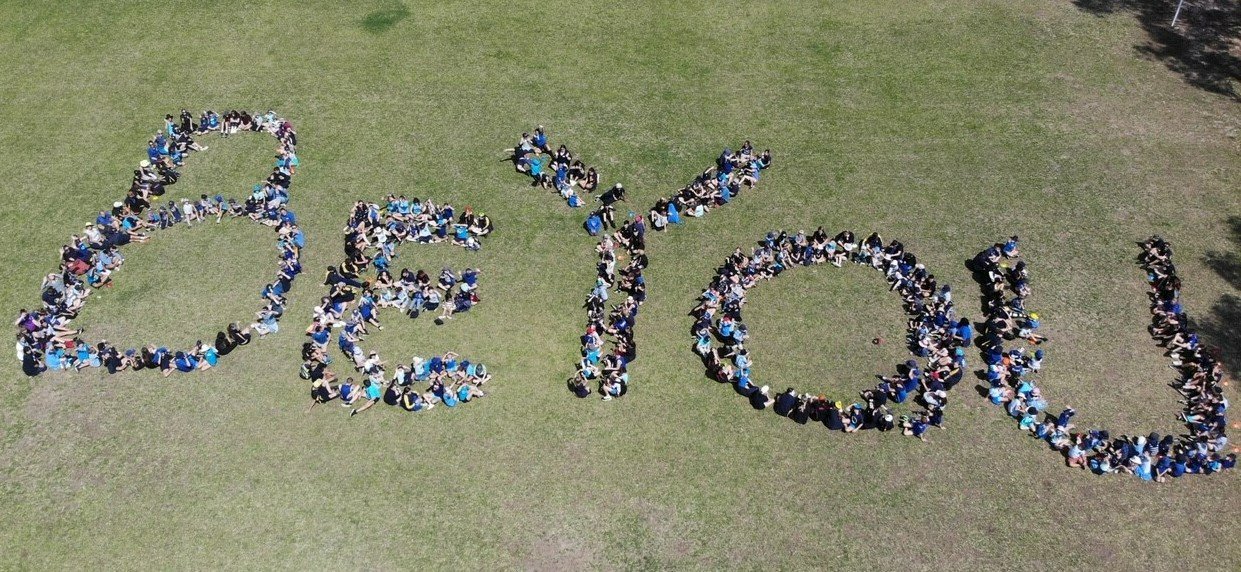 Students make a Be You sign